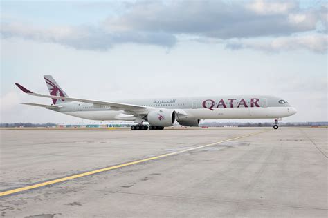 Qatar Airways Airbus A350 parked at New York JFK airport terminal