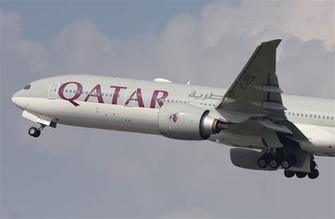 Qatar Airways Boeing 777-300ER operating Virgin Australia branded flight to Doha