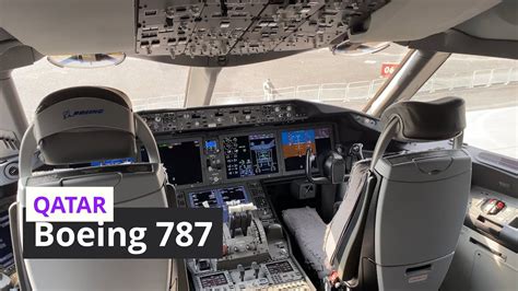 Qatar Airways Boeing 787 Dreamliner parked at Doha airport gate