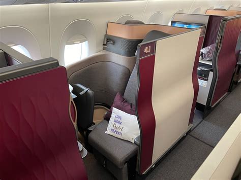 Qatar Airways business class passengers boarding at LAX jet bridge