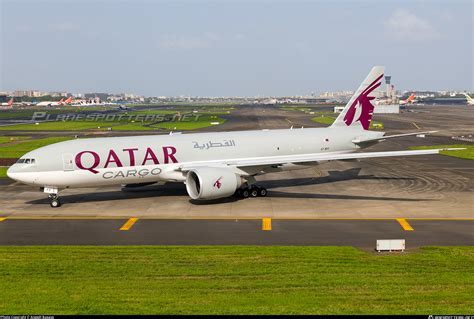 Qatar Airways Cargo Boeing 777 freighter loading pallets