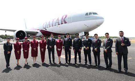 Qatar Airways crew celebrating punctuality and platinum winner award
