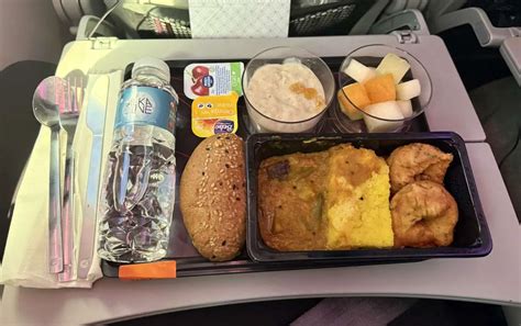 Qatar Airways economy class meal chicken chasseur tray inflight