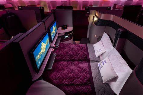 Qatar Airways Qsuite business class double bed center suite overnight bedding