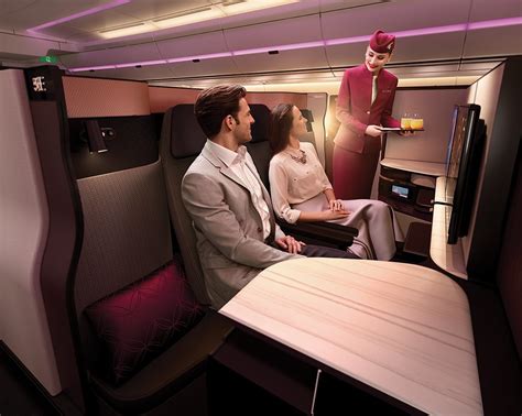Qatar Airways Qsuite dining service with private suite doors closed