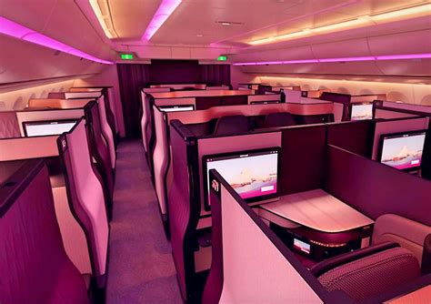 Qatar Airways Qsuite enclosed cabin ambient lighting night