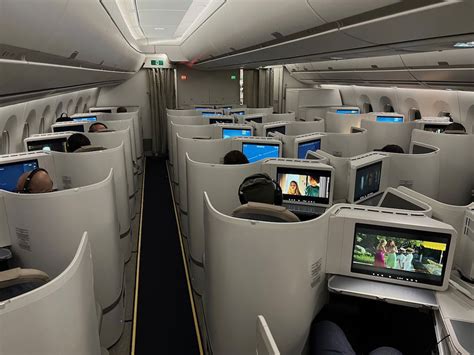 quiet Airbus A350 business class cabin during overnight flight
