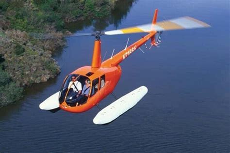 R44 Clipper with floats operating during a coastal rescue in South Africa