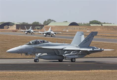 RAAF EA-18G Growlers taxiing on a military airbase