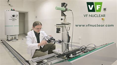 radiation calibration lab with technicians testing ionization chambers and dosimeters