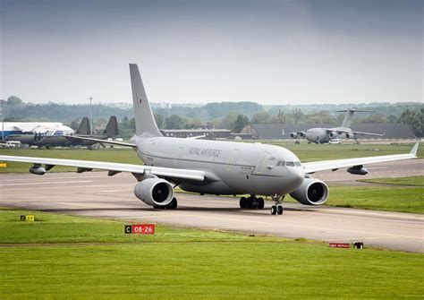 RAF Brize Norton logistics hub with civilian charter aircraft