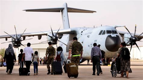 raf transport aircraft parked at bangalore’s military terminal at night