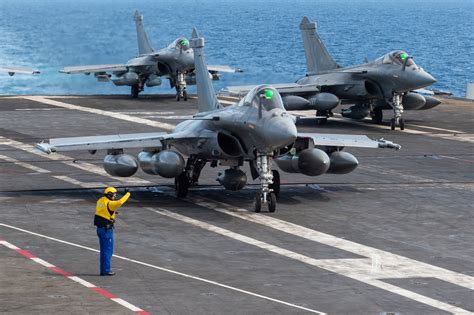 Rafale fighter jet at Indian Air Force base with ground crew, symbolizing operational readiness