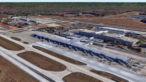 Raleigh-Durham airport runway with multiple commercial aircraft preparing for departure