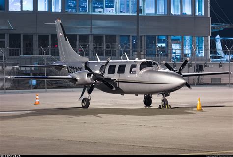 rare Piper Aerostar 700P parked on private airstrip