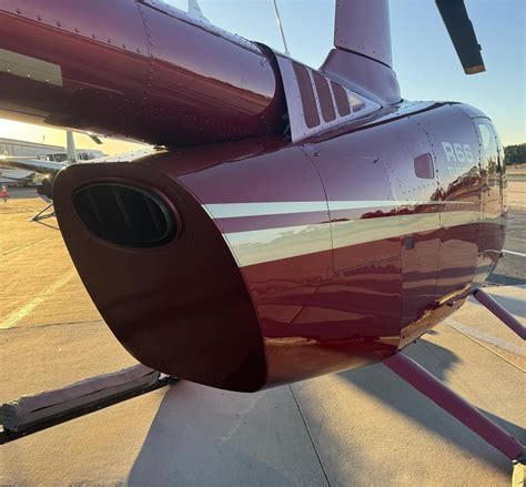 Rear view of Robinson R66 with symmetrical tail stabilizer modification implemented post-2020