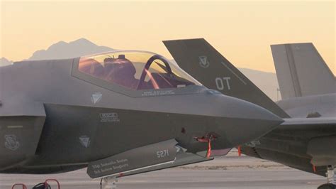 Red Flag exercise fighter jets formation Nellis Air Force Base Nevada desert sky