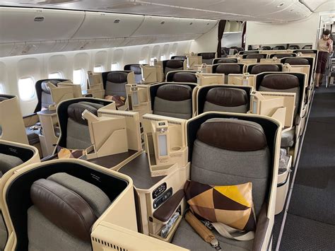 Refurbished Etihad Airways Boeing 777 business class cabin with modern seats