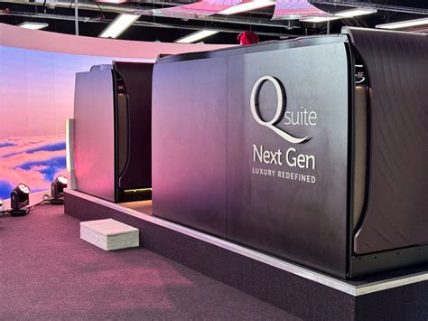 rendering of qsuite next generation cabin with companion suite and oled screens