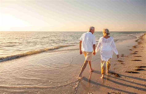 retirees walking pier village with ocean view in new jersey