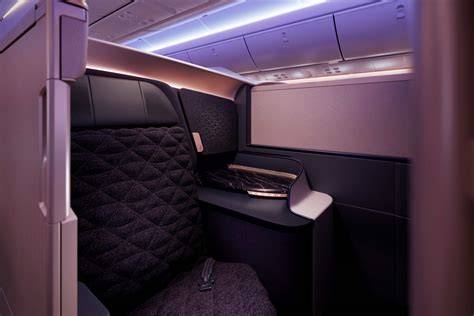 Riyadh Air Safran Unity business class suite with privacy door pillows duvet and mattress pad