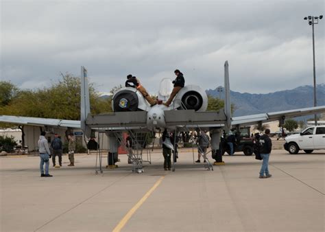roadside view of aircraft rows from Davis-Monthan perimeter