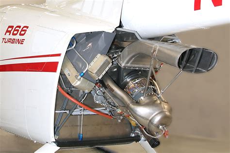 Robinson R66 Turbine engine bay featuring the compact Rolls-Royce RR300 engine, photographed during a 2023 maintenance check