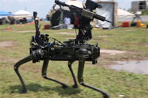 robot dog equipped with a firearm conducting maneuver exercises at CAPEX