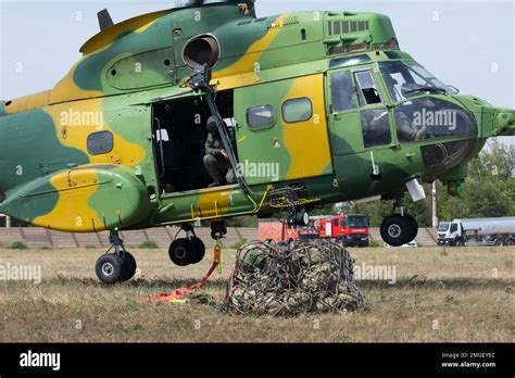 romanian iar brasov helicopter technicians in hangar