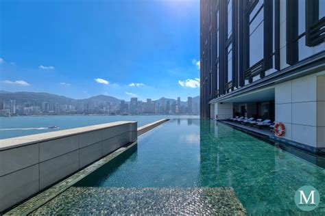 Rosewood Hong Kong infinity pool with Kowloon harbor skyline