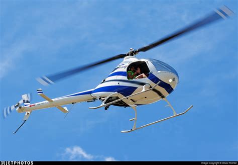 rotorway exec-162f 2015 edition in flight over Colorado hills
