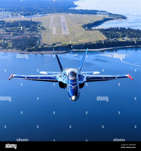 Royal Canadian Air Force CF-18 Hornet in flight over Canadian landscape