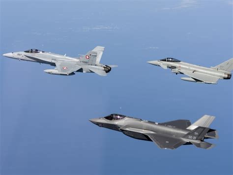 RUAG technician inspecting F-35A structural components at Swiss facility
