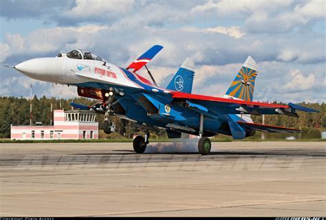 Russian Air Force Su-27 executing high-G maneuvers during an airshow