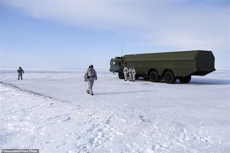 Russian Arctic missile base with Bastion launchers and mobile command unit in snow-covered terrain