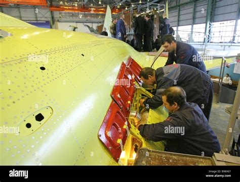 russian engineers assembling su-35s fighters at komsomolsk-on-amur uac facility