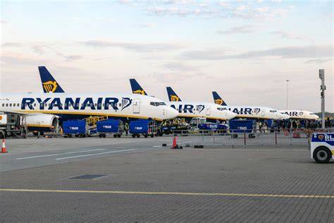 Ryanair aircraft on the apron at London Stansted Airport terminal