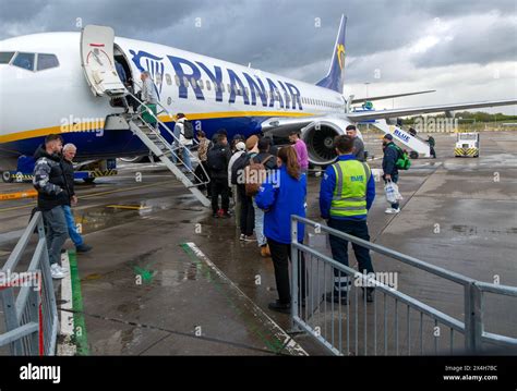 Ryanair Boeing 737 parked at London Stansted Airport remote boarding stand