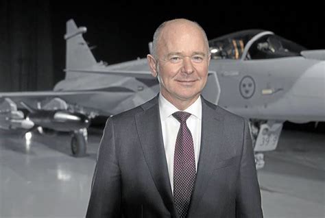 Saab CEO Micael Johansson at international defense expo speaking on next-gen airpower
