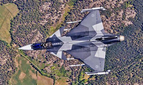 Saab Gripen E fighter jet operating from a northern airbase runway