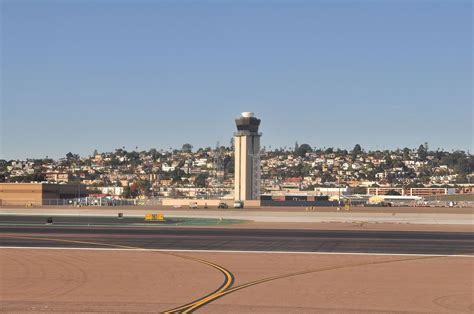 san diego airport control tower panoramic view with copa jet