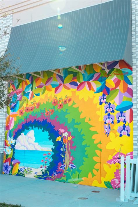 sarasota downtown arts district with street murals and outdoor cafes