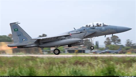 Saudi Arabian F-15SA performing a low-altitude pass with precision-guided munitions