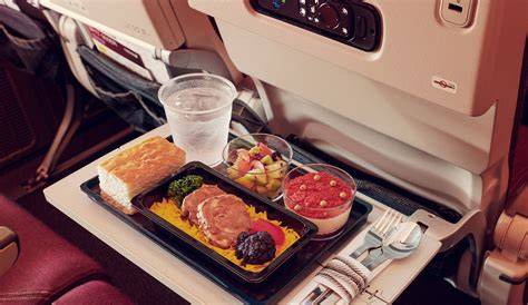 Saudia economy class halal meal tray with Middle Eastern cuisine and generous portions