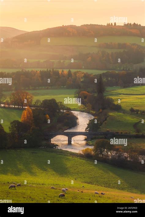 scenic view of Peebles with River Tweed and distant hills at sunset