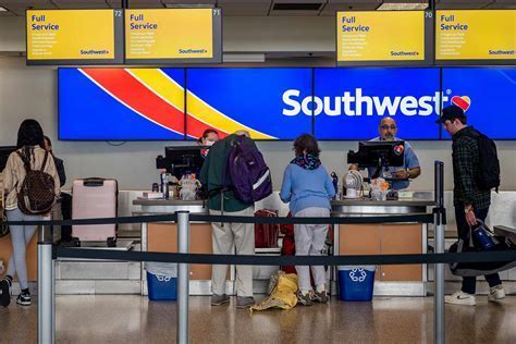 seattle tacoma airport terminal southwest check-in counter bustling with passengers