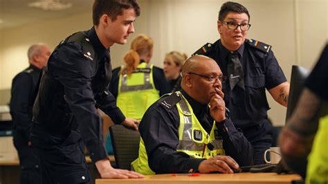 senior border force officer leading training session for new recruits