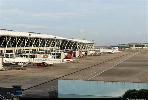 Shanghai Pudong International Airport bustling with passengers during July 2025 travel peak