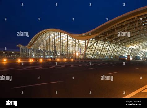 Shanghai Pudong International Airport skyline and aircraft taxiing before transpacific departure