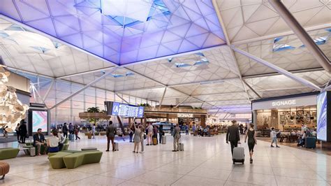 Sharjah International Airport departures hall with connecting passengers
